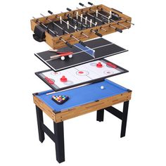 three tables with foosball and air hockeys on them, one is black and the other is blue