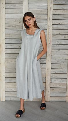 "Draped linen dress / Loose fit linen dress / Linen smock sundress / Organic linen dress / Flax dress / Stylish linen dress / Silver gray This draped, modern, long, loose natural linen dress is asymmetric, made with pleat in front of dress and side pockets. It is cozy, comfortable and soft, made from washed and softened medium weight natural Lithuanian linen. You can choose from 16 colors. (The color palette you can find it in the end of listing). In the photo: dress - Silver gray Details: - 100 Square Neck Linen Maxi Dress For Daywear, Spring Linen Dress With Square Neck, Casual Linen Square Neck Dress For Summer, Casual Linen Dress With Square Neck For Summer, Square Neck Linen Day Dress, Linen Square Neck Sundress, Linen Unlined Midi Dress For Daywear, Unlined Linen Sundress Midi Dress, Unlined Linen Midi Dress