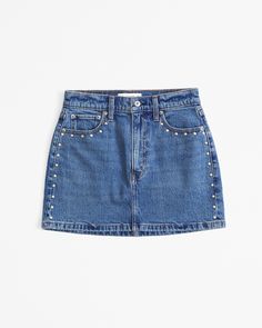 Our classic high rise denim mini skirt, featuring a medium wash, on-trend studded details and made from our lightweight rigid denim, a super soft authentic cotton fabric with no stretch. Jean Skirts, Madrid Outfits, High Rise Denim Skirt, Dressy Jeans, Fall Fits, Denim Details, Jean Skirt, Denim Mini Skirt, Denim Fabric