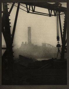 a black and white photo of an industrial area