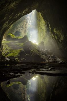 the light at the end of the tunnel shines brightly into the dark water below