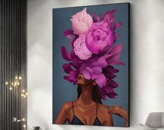 a woman with flowers on her head is standing in front of a wall mounted painting