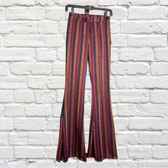 New Altar’d State Flare Striped Metallic Pants Nwt Size Xs (Extra Small) Stripe Colors: Shades Of Red, Navy Blue, Glittery Gold. Approximate Measurements, Taken While Flat: Waist: 12 1/2” Rise: 9 1/2” Inseam: 34” Rn# 157389 Cut# 10722 Style# H1027l064jd 89% Polyester 8% Metallic 3% Spandex Questions? Leave A Comment Below! Striped Fitted Pants For Night Out, Striped Fitted Wide-leg Bottoms, Striped Fitted Wide-leg Pants, Fitted Striped Wide-leg Pants, Striped Stretch Bottoms For Night Out, Retro Wide Leg Bottoms For Night Out, Striped Wide Leg Pants For Night Out, Multicolor High-waisted Pants For Fall, Retro Bottoms For Night Out In Spring