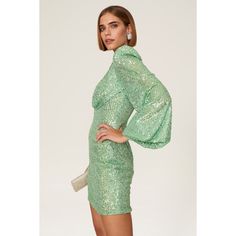 Light green sequins (100% Polyester). Sheath. V-neck. Long sleeves. Back zipper clousre. 32.5" from shoulder to hemline. Imported. Green Sequin Bodycon Dress For Party Season, Glamorous Green Mini Bodycon Dress, Green Sequined Bodycon Dress, Glamorous Green Sequined Bodycon Dress, Green Bodycon Dress For Night Out Party Season, Glamorous Green Bodycon Dress For Party Season, Green Sequin Bodycon Cocktail Dress, Glamorous Green Bodycon Mini Dress, Green Sequin Bodycon Mini Dress