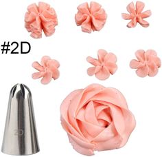 there are several different types of icing decorations on the white background, including one pink frosted flower and two silver cones