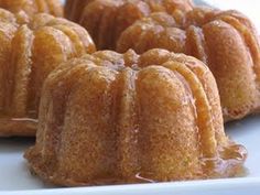 several bundt cakes sitting on top of a white plate