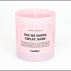 a pink candle that says you're doing great, babe