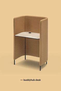 an office cubicle with a desk and chair in the corner, on a beige background