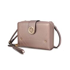 Meet our Sage Smartphone Crossbody Handbag, a compact beauty crafted from high-quality vegan leather with gold-tone hardware. Measuring 8.5" W x 6" H x 2" D, this versatile accessory effortlessly combines style and practicality. Carry it with the 8" wristlet or adjust the strap (14" to 25") for personalized wear. The interior offers organized convenience with 11 card slots, a phone pocket, a zip compartment, and two slip pockets. The magnetic snap closure and secure zip fastening add sophistication, making it perfect for those who prioritize both style and functionality in their essentials.Product Care : Dry cleanMaterial : LeatherCountry of origin : China Bootie Sandals, Straw Bags, Sneaker Slippers, Baby Boy Shoes, Wristlet Wallet, Home Products, Small Accessories, The 8