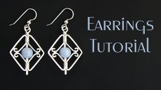 the earrings are made with silver wire and blue glass beaded in an intricate design