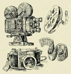 an old fashioned movie camera and film reels