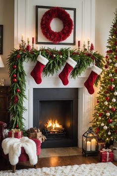 a fireplace decorated for christmas with stockings and wreaths