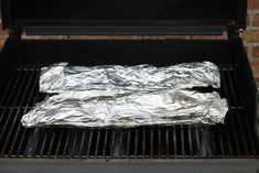 foil wrapped in aluminum foil sitting on top of a grill