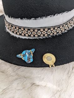 Hat Clips for your favorite trucker hat or cowboy hat!   These can even be slipped on a beanie!  These hat clips slip on the brim of your hat and leave no damage!  They have magnetic tops, so choose your favorite magnet topper for your hat clip! Pick a magnet to accessorize your hat - Sunflower, cow with gold accent, cow with silver accent, turquoise stone, concho or Miller Lite.   Then Note in your order what color magnet base you would like, brass, silver or gunmetal. If not noted one will be Cowboy Hut, Hat Clip, Chapeau Cowboy, Miller Lite, Hat Clips, Handmade Gift Wrap, Cow Boy, Stick Pins, Gold Accent