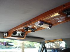 the interior of a car with two cameras mounted to it's ceiling