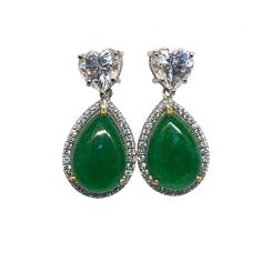 These earrings are made of 925 Silver set with Simulants of Emerald Green Jade and Diamonds  Main stones can be replaced on request with a Stone Color of your Choice.  The additional stone options listed are Simulated versions of the said Gemstones and not Natural Gemstones. These are custom made items and are made to order. Request to please clarify all your doubts and queries before placing your order. Payment: We accept only Pay Pal Shipping:  -We use India Post EMS Service for all orders and Canary Yellow Diamonds, Emerald Cabochon, Emerald Earrings Drop, Jade Earrings, Heart Dangle Earrings, Heart Drop Earrings, Art Deco Earrings, 925 Silver Earrings, India Post