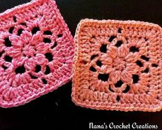 two crocheted squares sitting next to each other on top of a black surface