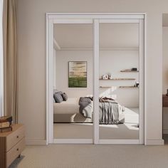 an open door leading to a bedroom with a bed in the background