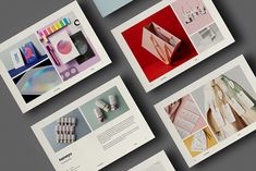 an assortment of brochures are displayed on a gray background with different colors and shapes