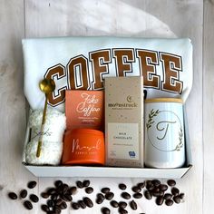 the coffee gift box is filled with goodies for someone to have in their life