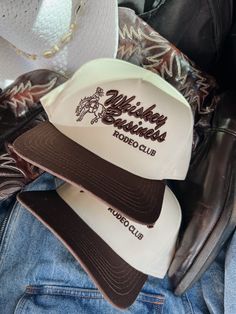 - Whiskey Business Rodeo Club - brown vintage trucker hat! - In collaboration with Caleigh Hardy! Retro White Hat For Rodeo, Trendy Brown Snapback Hat, Trendy Brown Trucker Hat With Short Brim, Retro Brown Hat For Country Events, Vintage Brown Baseball Cap One Size Fits Most, Retro Brown Hats One Size Fits Most, Retro Brown Hat, One Size Fits Most, Retro Brown Hats, One Size Fits Most, Retro Curved Brim Baseball Cap For Rodeo