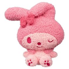 a pink stuffed animal sitting on top of a white floor