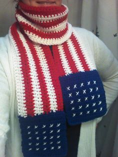 a woman wearing a red, white and blue scarf