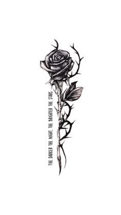 a black and white drawing of a rose with the words, love is in the air