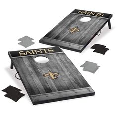 two new orleans saints cornhole game boards