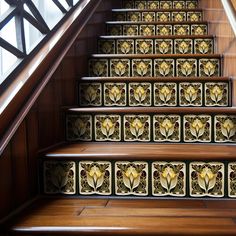 the stairs are decorated with decorative tiles