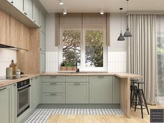 a kitchen with wooden floors and green cabinets