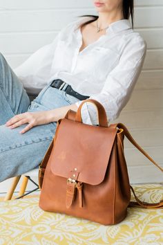 This personalized vintage leather backpack is the perfect blend of style and function. Designed for women, it serves as both a casual purse and a practical rucksack for college or work. Crafted from premium leather. personalized leather backpack, vintage leather backpack, leather backpack purse, women rucksack, casual work bag, college backpack, leather work bag, women’s leather bag, stylish leather backpack, leather travel bag Leather Work Bag Women, Casual Work Bag, Leather Work Bag, Vintage Leather Backpack, Bag College, Backpack Vintage, Casual Purse, Leather Backpack Purse, College Work