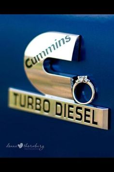 there is a sign that says cummins and turbo diesel