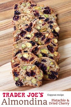 trader joe's pistachio and dried cherry bread is shown on a cutting board