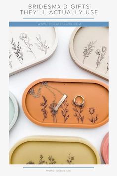 the bridesmaid gifts they'll actually use are displayed in different trays