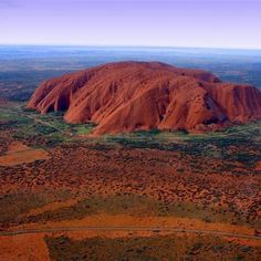 an aerial view of aye rock in the outback