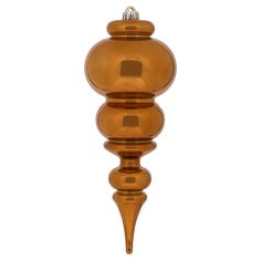 an orange glass ornament hanging from a hook