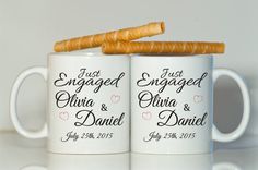 two white coffee mugs with the words grandmother of the groom and grandfather of the groom written on them