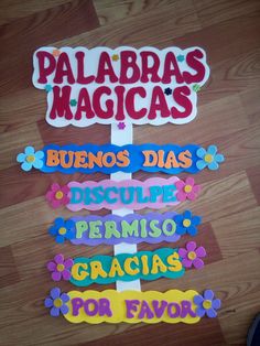 there are many magnets on the floor to spell out what is in each language