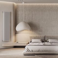 a bedroom with a large bed and a radiator in the wall next to it