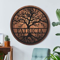 a wooden wall hanging with a tree on it