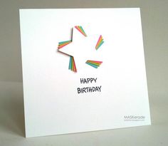 a birthday card with a star cut out of paper