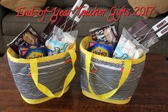 two bags filled with snacks on top of a wooden table