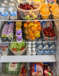 an open refrigerator filled with lots of food