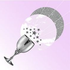 a silver cup with stars on it and a half moon in the sky behind it