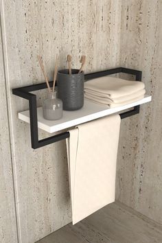 a towel rack with two cups and toothbrushes on it in the corner of a bathroom