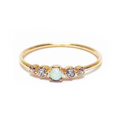 14k gold plated brass delicate opal ring with shimmering cz stones. Simulated opal cabochon Questions about Shipping & Returns? Elizabeth Stone, Delicate Gold Ring, Gold Wedding Bands Women, Rose Gold Wedding Bands, Bridal Gold Jewellery, Opal Ring, Sea Glass Jewelry, Bridal Jewelry Sets, Beaded Rings