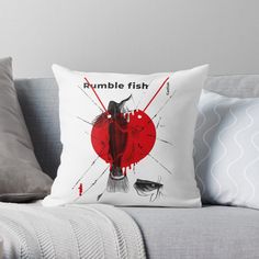 a throw pillow with an image of a fish and the words rumble fish on it