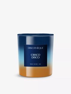 a candle that is blue and orange with the words cinco di discoo on it