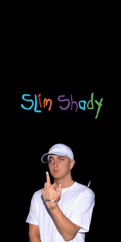 a man standing in front of a black background with the words slim shady on it